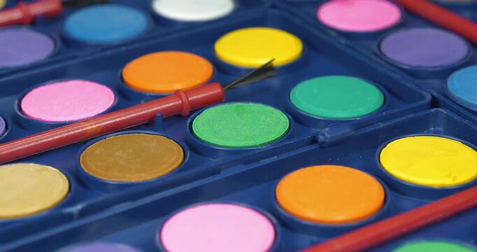 Palette of colours. Watercolor paints in various colors for painting projects. Palette of vibrant watercolor paints ready for artistic painting sessions
