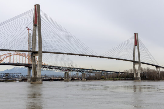 Cable-Stayed Bridge Over River With Concrete Pylons Near New Westminster, Vancouver, BC