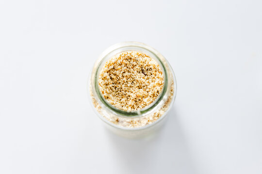 chilli flakes in glass pantry jar; top down close up