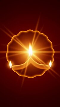 Glowing diya lamp burning against dark background. Traditional oil lamp flame during Diwali festival. Spiritual light for Hindu ceremony and religious celebration. Vertical video