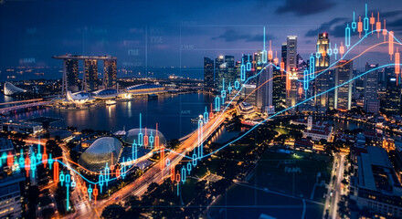 Fototapeta premium シンガポールの近代的な都市夜景に重なる株価チャート、世界経済とグローバル金融投資のイメージ