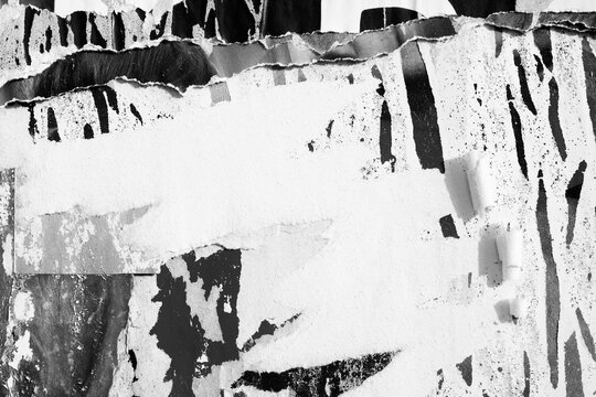 Old ripped torn black and white fly posters textures backgrounds grunge creased crumpled paper vintage collage placards empty space for text	
