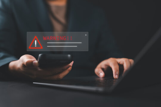 Mobile security warning alert on smartphone with notification popup, representing cybersecurity risks, data protection, safe online access, and digital threat prevention.