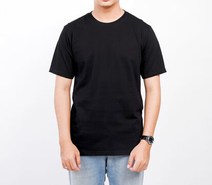 Male body wearing black t-shirt and blue jeans seen from behind and isolated on white background