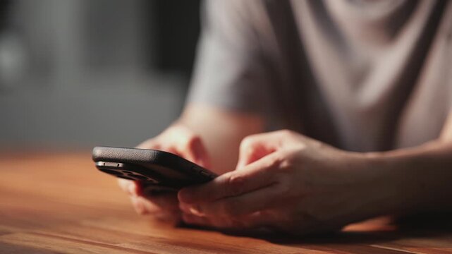 Smartphone user using app, typing chat with artificial intelligence assistant technology, searching information on social media network, closeup view of modern lifestyle.