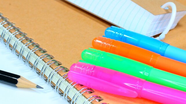 Colorful markers and flash cards for study