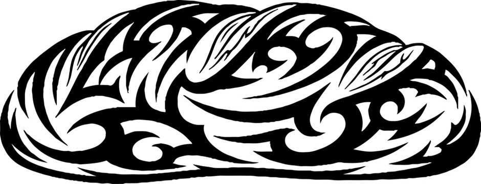 Tribal style loaf of bread with decorative scrollwork