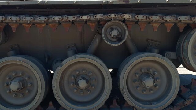 VIENNA, AUSTRIA - MAY 4, 2026: Close up shot of an M60 Patton main battle tank continuous track mechanism, road wheels, and suspension chassis on display at the Heeresgeschichtliches Museum.