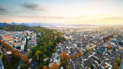 Fototapeta premium Panoramic Autumn View of Historic Old Town and Distant Mountains