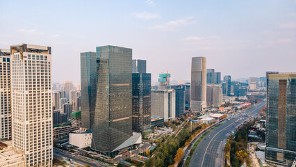 Aerial View of Modern Downtown City Skyline and Urban Highway © zhouyilu