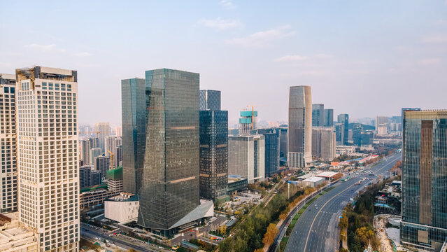 Aerial View of Modern Downtown City Skyline and Urban Highway