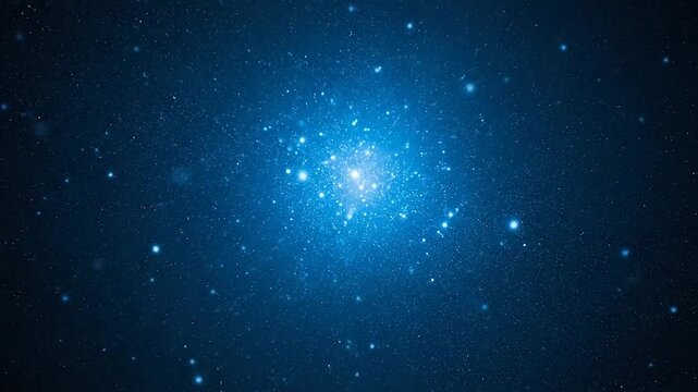 A vibrant blue nebula glows brightly within the vast darkness of deep outer space