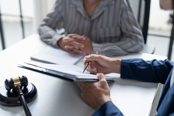 Lawyer businessman working with lawbook in office or courtroom Legal counsel with gavel and legal...