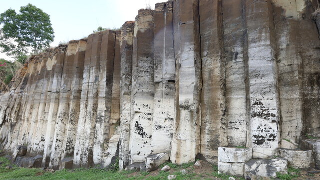 Hexagonal basalt pile. Buri Ram Columnar Basalt sometimes called the Grand Canyon of Buri Ram in Nang Rong District with natural cascading geometric shapes with selective focus.