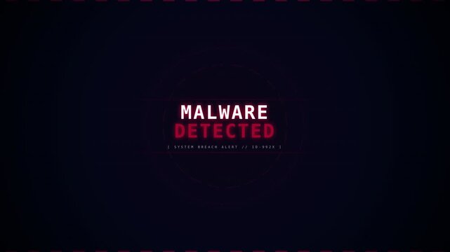 A digital screen displays a warning message in red and white text indicating malware detection with a dark background