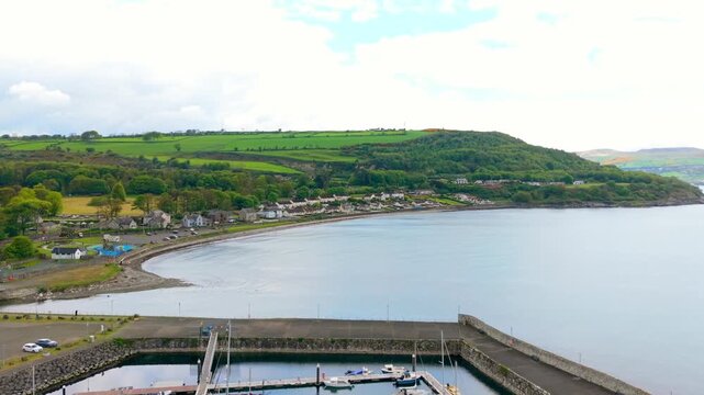 Rising 4K 60FPS aerial video of Glenarm in County Antrim, Northern Ireland in the UK. Produced in 3840x2160 and with Rec709 color.