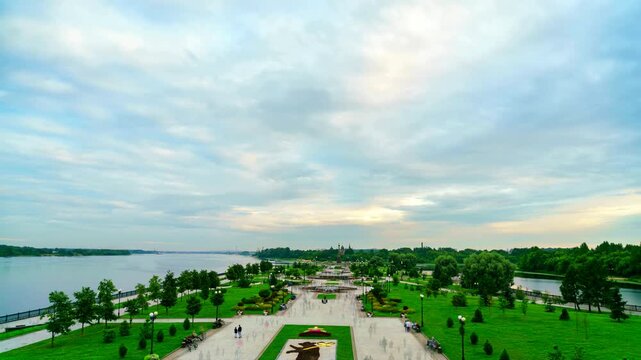 Yaroslavl, Russia. Park on the arrows. The place where the Kotorosl River flows into the Volga River. The transition from sunset to night, TimeLapse, Tilt down
