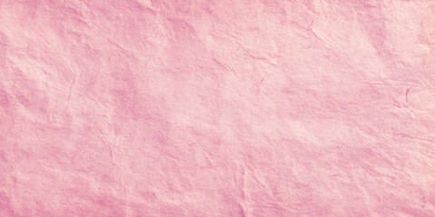 Fototapeta premium Pink crumpled paper texture background with soft wrinkles and creases for design and craft projects