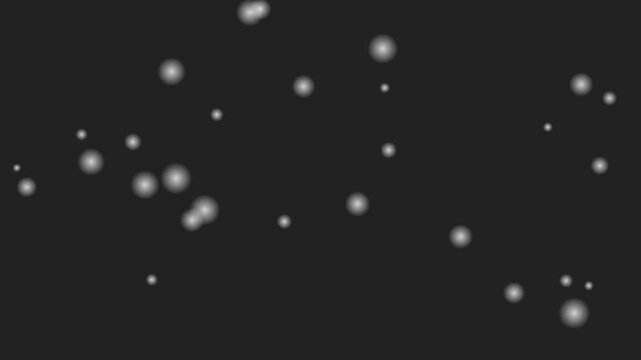 Abstract background featuring soft glowing white orbs on a dark black surface
