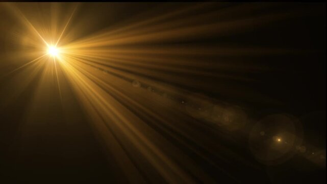 Golden optical lens flare cinematic animation with moving light streaks, spotlight glow, abstract bokeh particles and shining sun rays on black background for luxury video overlay intro 4k