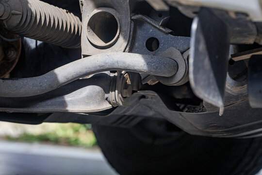 The suspension of a four-wheel drive pickup truck that has been used for rough use