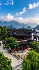 Fototapeta premium A serene traditional Asian temple complex nestled among lush greenery