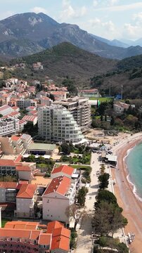 Aerial view of petrovac town and beach in montenegro