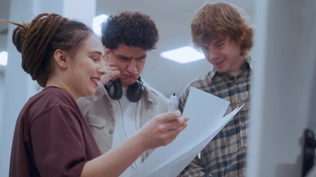 Diverse group of college students brainstorming and discussing a challenging academic assignment