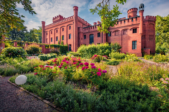 Picturesque summer view of Jan III Sobieski red brick casttle. Wonderful morning cityscape of Rzucewo village, district of Gmina Puck, within Puck County, Pomeranian Voivodeship, Poland, Europe.