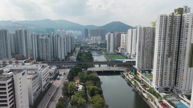 Shek Mun mixed industrial and residential skyline near canal May 12 2026