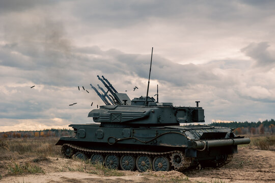 The tank is rolling and the shells are flying