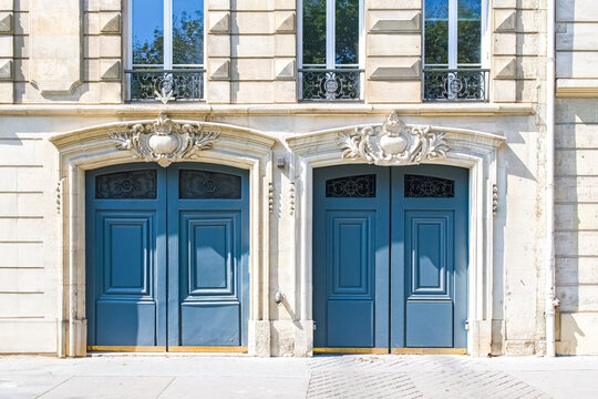 Paris, two ancient wooden doors avenue de Breteuil, luxury building in the 7e arrondissement
