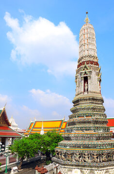 Giant stupa in Buddhist Temple of Dawn Wat Arun, sightseeing landmark of Bangkok, Thailand. Famous tourist attraction. Summer vacation, relaxing, topic of travel, trip, cruises, tour