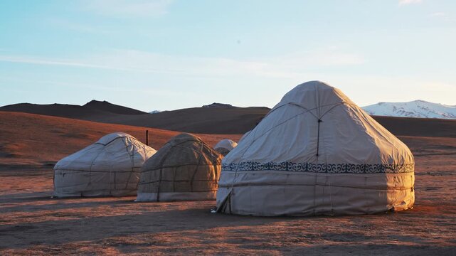 nomadic yurt campsite near Song-Kul Lake, Kyrgyzstan travel holiday destination in Central Asia