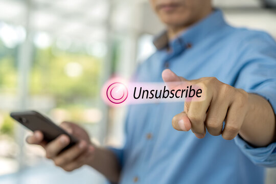 User pressing unsubscribe button on smartphone, representing subscription cancellation, recurring billing control, and account management with digital platform settings and payment termination process