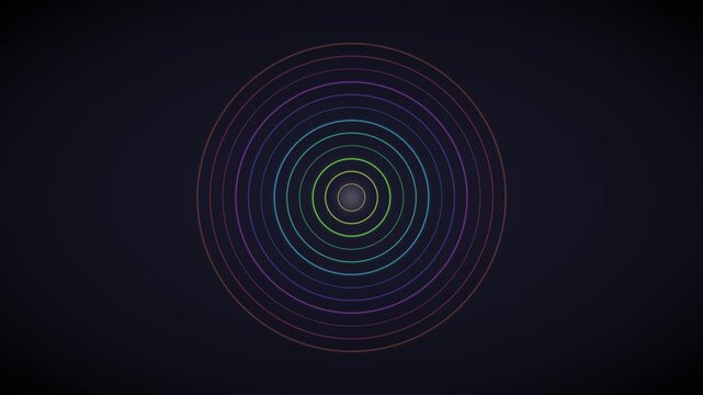 Concentric rainbow circles radiating from a central point on black background