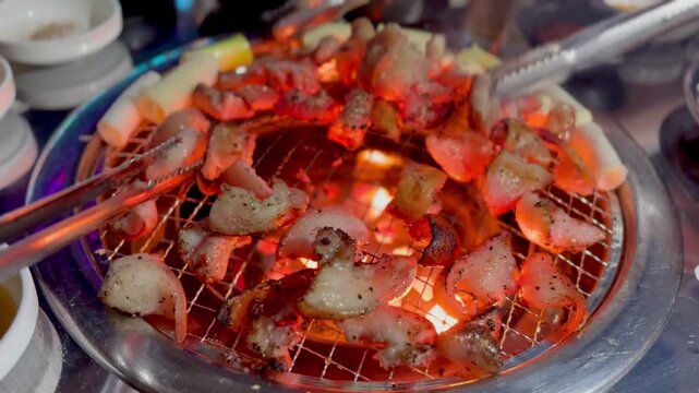 Delicious Korean style grilled pork tail BBQ
