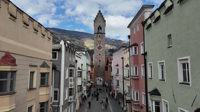 Vipiteno South Tyrol Aerial Drone Forward Flight Over Town Main Street and Tower Cinematic