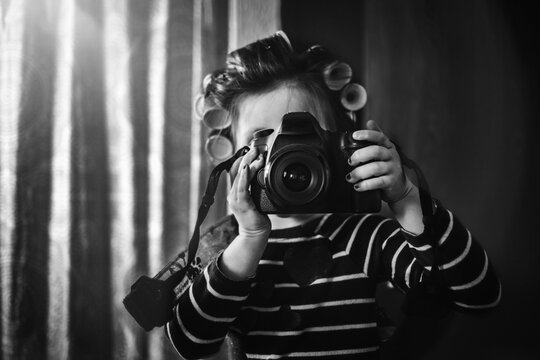 Young Girl Taking Picture of herself in mirror