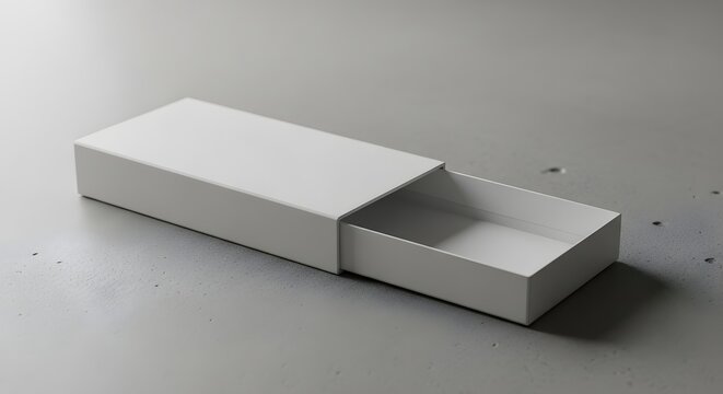Minimalist still life an empty white rectangular box with sliding drawer on a gray surface