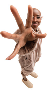 Isolated person in beige outfit with glasses reaching hand toward camera on transparent background, wide angle perspective, dynamic composition and creative photography concept