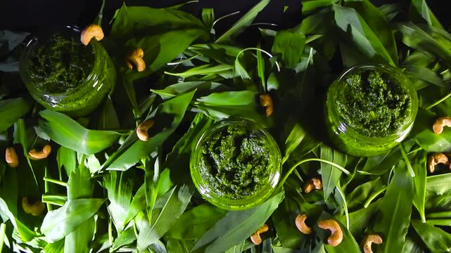 Wild Garlic Pesto Jars with Fresh Leaves and Cashew Nuts