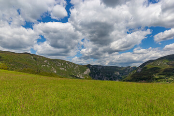 Fototapeta premium Scenic mountain landscape of Western Serbia during the lush early summer season