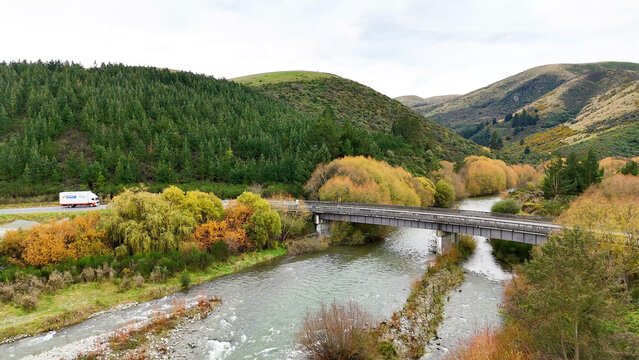 Aerial View of a Bridge Crossing a River in Akaroa New Zealand