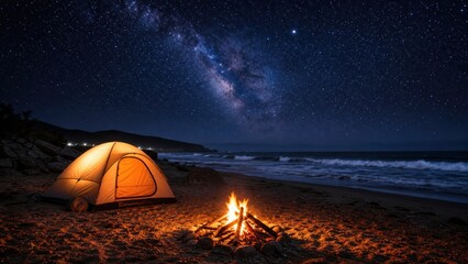 Fototapeta premium Glowing camping tent and warm campfire on a sandy beach under a majestic starry night sky with the Milky Way