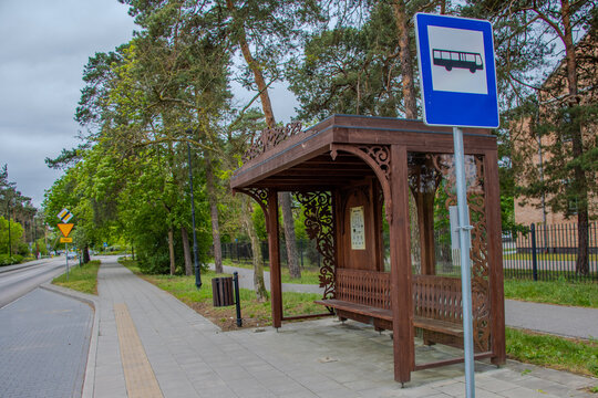 Stylish, wooden bus stop in Otwock, Poland.