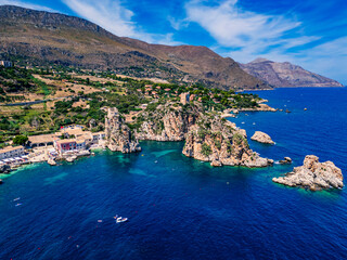 Obraz premium Beauty of the nature of the Sicilian coasts. Bay of Scopello and its stacks. View from above.
