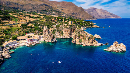 Obraz premium Beauty of the nature of the Sicilian coasts. Bay of Scopello and its stacks. View from above.