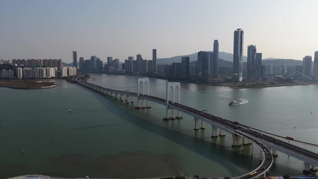 Sai van bridge connecting taipa and macau peninsula with cityscape