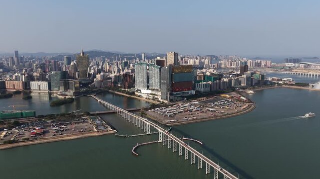 Aerial view of macau cityscape and governor nobre de carvalho bridge